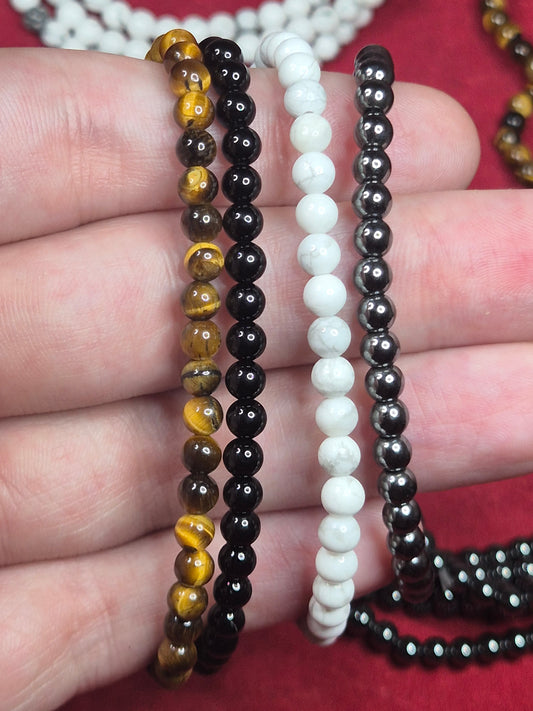 Elastisches Kugelarmband 4mm Perlen, Hämatit, Turmalin schwarz, Tigerauge, Howlith, Blutstein Schörl