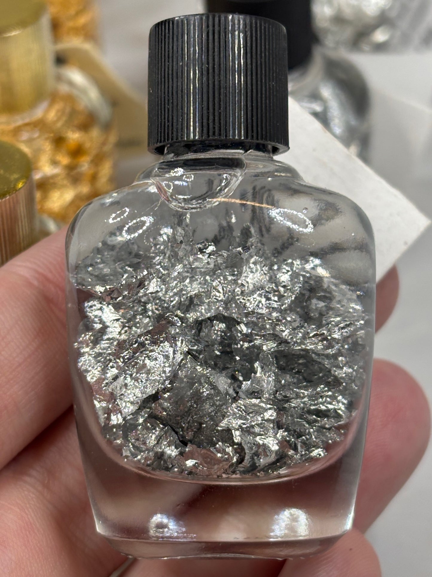 Gold oder Silber in bruchsicherem Glas, Brasilien Blattgold Blattsilber