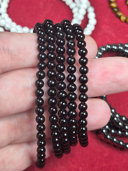 Elastisches Kugelarmband 4mm Perlen, Hämatit, Turmalin schwarz, Tigerauge, Howlith, Blutstein Schörl